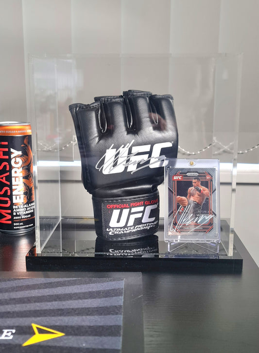 Carlos 'Black Jag' Ulberg signed glove and signed card in display case.